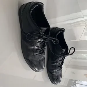 Black lace up Prada mens sneakers.